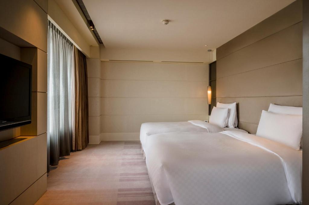 Phòng có giường queen Khách Sạn Nikko Sài Gòn